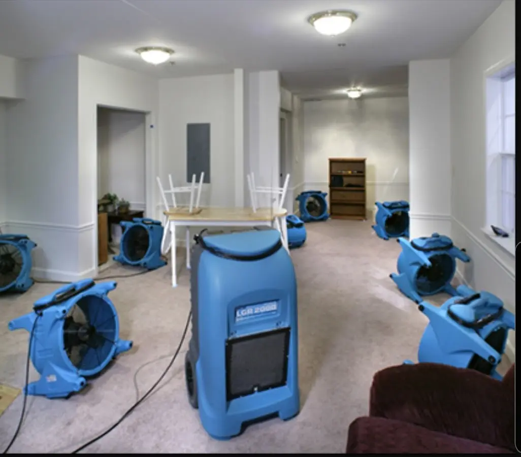 Air movers and dehumidifier setup for Water Extraction & Removal in Watertown